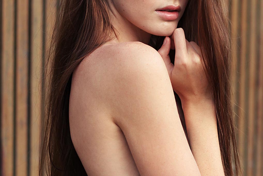 girl with good skin premature aging wearing sunscreen